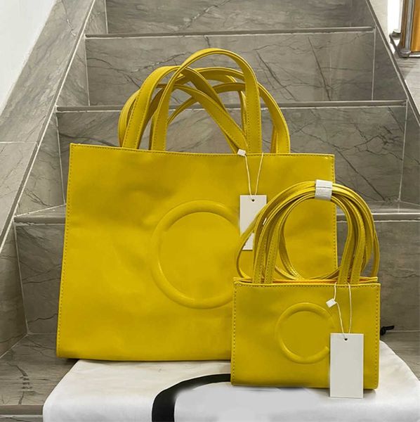 designer european and american fashion tote camera bag two sizes versatile shoulder messenger niche high sense
designer european and american fashion tote camera bag two sizes versatile shoulder messenger niche high sense