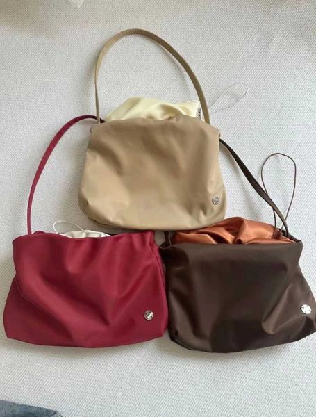 the row nylon cloud bag is niche with a large capacity pleated underarm bag and a high-end commuter tote shoulder bag for women
the row nylon cloud bag is niche with a large capacity pleated underarm bag and a high-end commuter tote shoulder bag for women