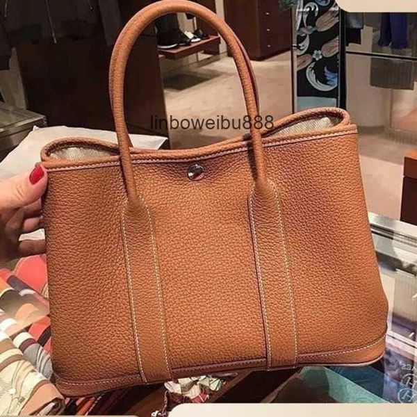 authentic handbag h designer garden party tote bag classic litchi pattern bag light luxury bucket bag women's layer cowhide oneshoulder
authentic handbag h designer garden party tote bag classic litchi pattern bag light luxury bucket bag women's layer cowhide oneshoulder