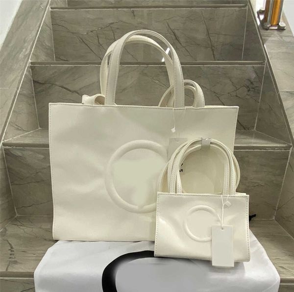 designer european and american fashion tote camera bag two sizes versatile shoulder messenger
designer european and american fashion tote camera bag two sizes versatile shoulder messenger