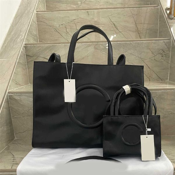 designer european and american fashion tote camera bag two sizes versatile shoulder messenger women's personalized bag
designer european and american fashion tote camera bag two sizes versatile shoulder messenger women's personalized bag