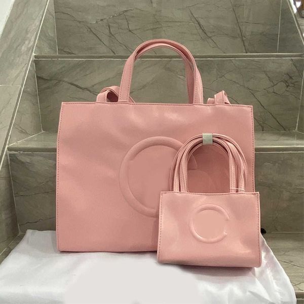 designer european and american fashion tote camera bag two sizes new versatile shoulder messenger foreign style handbag
designer european and american fashion tote camera bag two sizes new versatile shoulder messenger foreign style handbag