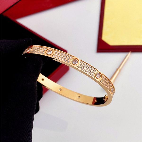 

High quality designer vacuum plated bracelet with three rows of diamonds and ten main diamonds. Exquisite and luxurious birthday gift for both men and women's parties