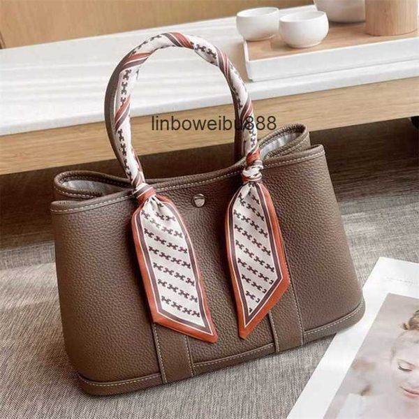 authentic handbag designer garden party tote bag new cow skin lychee pattern bag simple and large capacity oneshoulder diagonal span portabl
authentic handbag designer garden party tote bag new cow skin lychee pattern bag simple and large capacity oneshoulder diagonal span portabl