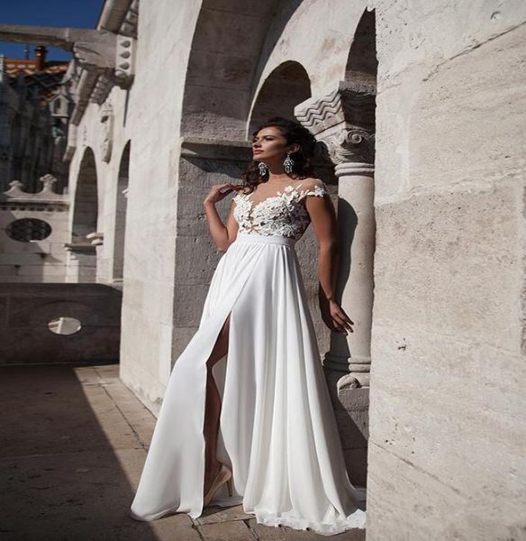 high side split chiffon long sweep spring wedding dresses sheer capped sleeves applique buttons see through back bridal gowns8243543, White
high side split chiffon long sweep spring wedding dresses sheer capped sleeves applique buttons see through back bridal gowns8243543, White