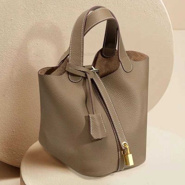 a designer tote bag her mas handbag picotin lock cargo bags new vegetable basket women's leather your bucket small bride
a designer tote bag her mas handbag picotin lock cargo bags new vegetable basket women's leather your bucket small bride
