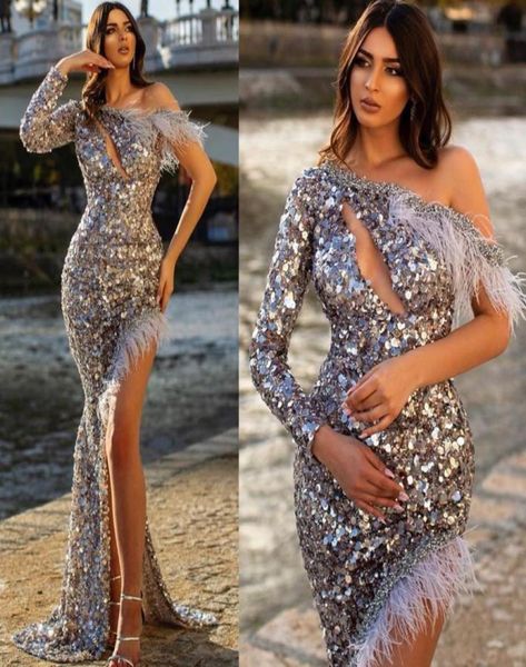 shining beaded mermaid sequined evening dresses one shoulder long sleeves side split prom gowns feather sweep train plus size form8288804, Black;red
shining beaded mermaid sequined evening dresses one shoulder long sleeves side split prom gowns feather sweep train plus size form8288804, Black;red