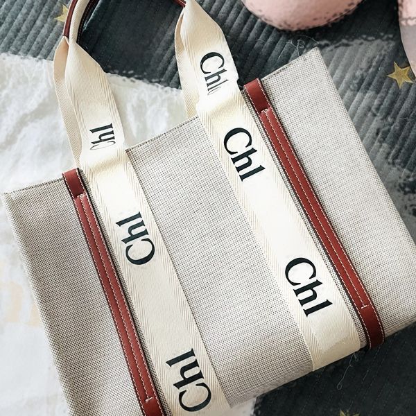 luxury womens woody totes bag fashion beach canvas mens shoulder shopping handbag travel purses cross body bags high capacity city designer
luxury womens woody totes bag fashion beach canvas mens shoulder shopping handbag travel purses cross body bags high capacity city designer