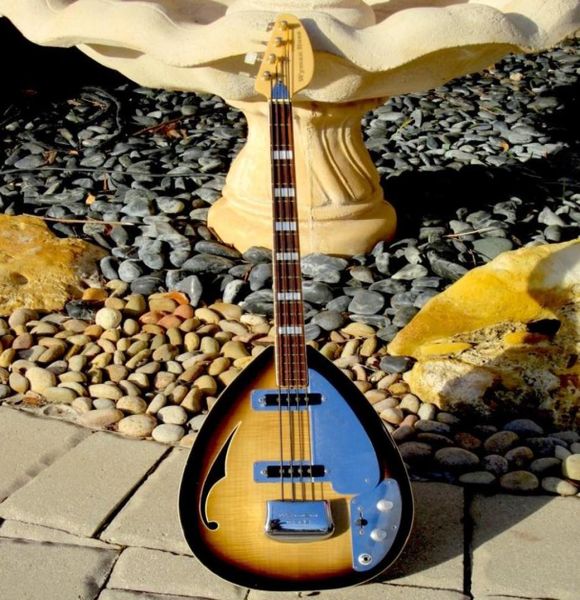 4 strings tobacco sunburst tear drop electric bass guitar semi hollow body single f hole large block inlay nickel hardware1894458
4 strings tobacco sunburst tear drop electric bass guitar semi hollow body single f hole large block inlay nickel hardware1894458