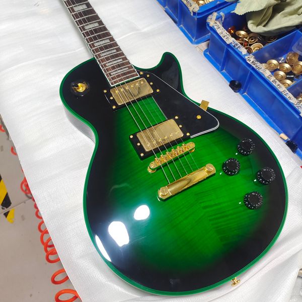 

Customized electric guitar, green body binding and green logo, gold accessories, available in stock, quick shipping