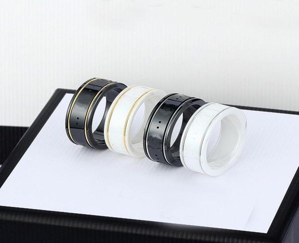 dhl ceramic band rings black white for women men jewelry gold silver ring 4 colors4205634
dhl ceramic band rings black white for women men jewelry gold silver ring 4 colors4205634
