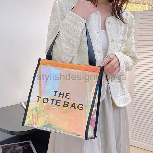 totes laser pvc transparent jelly tote bag women's new thetotebag high capacity handheld one shoulder tidal bagstylishdesignerbags
totes laser pvc transparent jelly tote bag women's new thetotebag high capacity handheld one shoulder tidal bagstylishdesignerbags