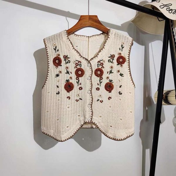 shirt with a small vest knitted short embroidered hollowed out cardigan sweater for women in the spring and autumn, White
shirt with a small vest knitted short embroidered hollowed out cardigan sweater for women in the spring and autumn, White
