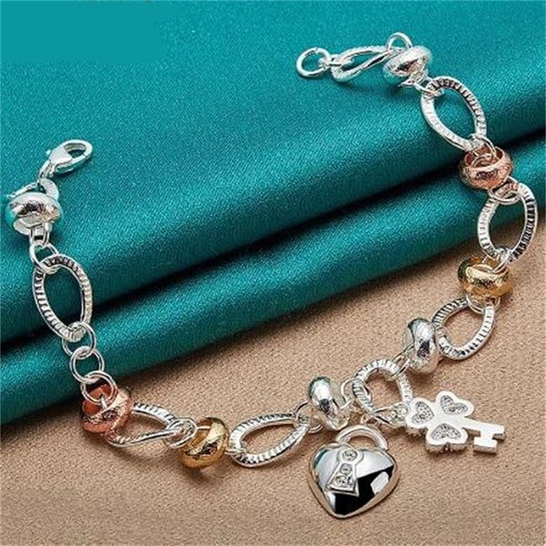 european and american luxury heart-shaped lock clover flower zircon bracelet ladies' wedding engagement charm jewelry ae1053, Golden;silver
european and american luxury heart-shaped lock clover flower zircon bracelet ladies' wedding engagement charm jewelry ae1053, Golden;silver