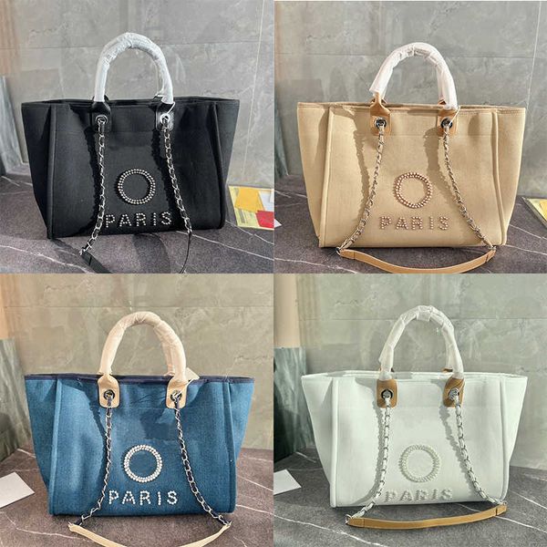 designer luxury tote bag canvas woven alphabet beach bag multifunctional large capacity messenger bag for women
designer luxury tote bag canvas woven alphabet beach bag multifunctional large capacity messenger bag for women