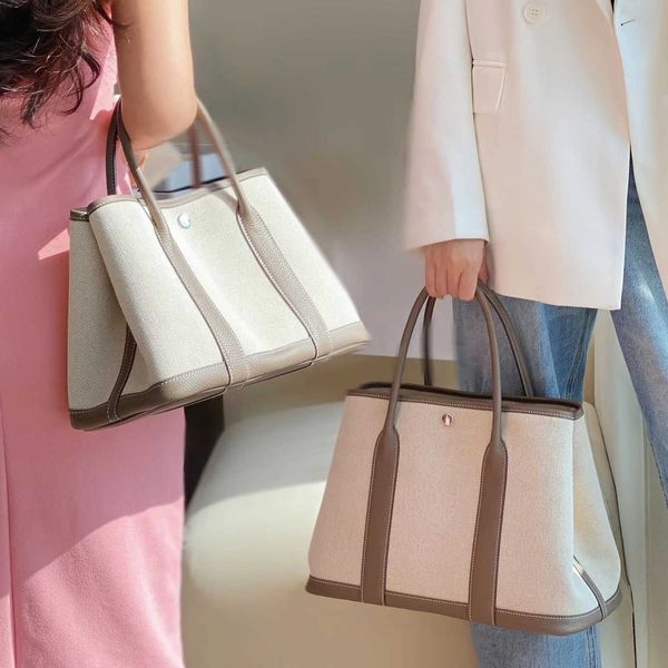 luxury h ermes party garden handbags for women 2023 new canvas with cowhide layer womens garden handbag leather color contrast sing with rea
luxury h ermes party garden handbags for women 2023 new canvas with cowhide layer womens garden handbag leather color contrast sing with rea