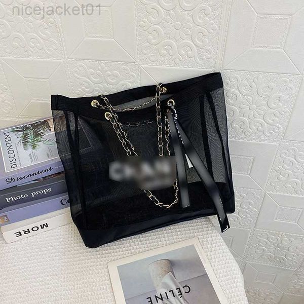 designer channel women bag transparent mesh handheld shopping bag 2023 summer new high capacity chain tote bag hollow underarm shoulder bag
designer channel women bag transparent mesh handheld shopping bag 2023 summer new high capacity chain tote bag hollow underarm shoulder bag