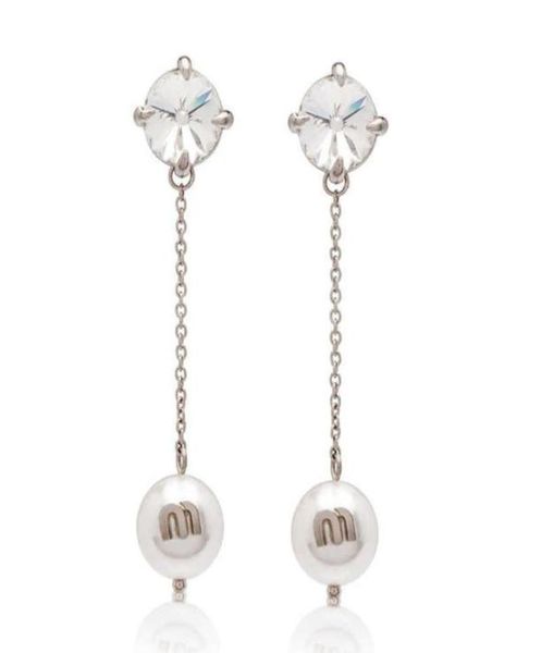 charm miu039s east gate net red women039s fashion pearl pendant long tassel simple earrings 22120062245136, Golden
charm miu039s east gate net red women039s fashion pearl pendant long tassel simple earrings 22120062245136, Golden