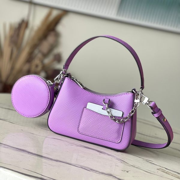 designer bag fashioned from grained leather with a detachable canvas pouch that sits in an outside pocket and is attached to the bag with a
designer bag fashioned from grained leather with a detachable canvas pouch that sits in an outside pocket and is attached to the bag with a