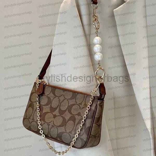 2023 new bag kouchi underarm pearl chain portable small square classic old flower mahjong bagstylishdesignerbags
2023 new bag kouchi underarm pearl chain portable small square classic old flower mahjong bagstylishdesignerbags