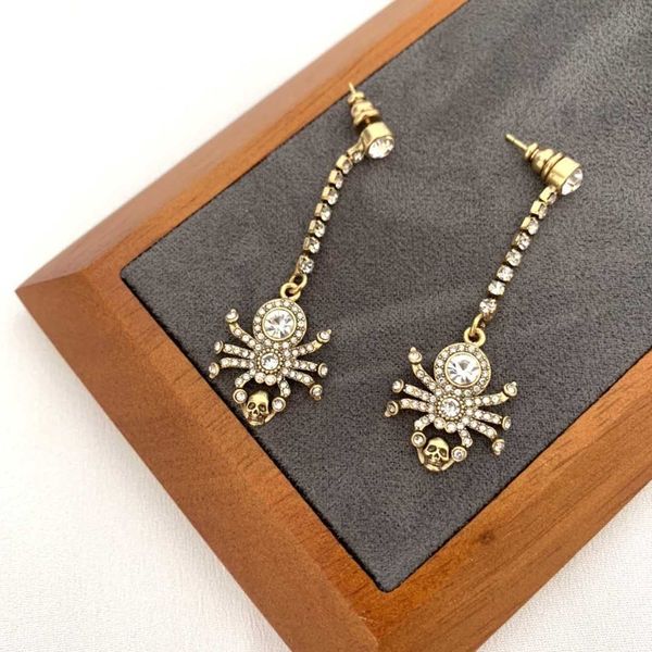 alexander earrings 21 new spider skull head earrings for women with a and personality copper plated gold long full diamond earrings, Golden
alexander earrings 21 new spider skull head earrings for women with a and personality copper plated gold long full diamond earrings, Golden