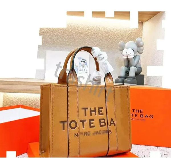 designer 5a the tote bag for woman embossing letter handbag luxury shoulder bags large capacity 34cm brown leather handbags women canvas ags
designer 5a the tote bag for woman embossing letter handbag luxury shoulder bags large capacity 34cm brown leather handbags women canvas ags