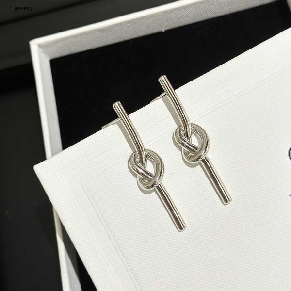 women designer earrings 925 sterling silver jewelry knotting design pendant earring #including box new arrival
women designer earrings 925 sterling silver jewelry knotting design pendant earring #including box new arrival