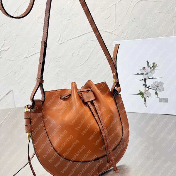 lowe puzzle saddles bag designer shoulder handbag women's high version cowhide bucket hand carrying wallet fashion large capacity semi-
lowe puzzle saddles bag designer shoulder handbag women's high version cowhide bucket hand carrying wallet fashion large capacity semi-
