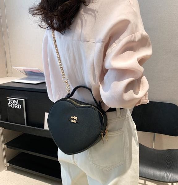 box bag cosmetic bags new heart bag fashion popular shoulder messenger bag heart-shaped
box bag cosmetic bags new heart bag fashion popular shoulder messenger bag heart-shaped