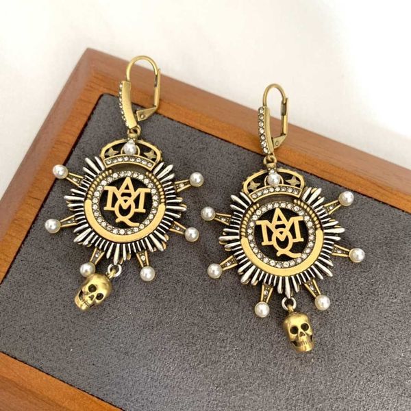 fashion designer alexander queen five point star skull head pendant earrings female personalized style earrings, Golden
fashion designer alexander queen five point star skull head pendant earrings female personalized style earrings, Golden