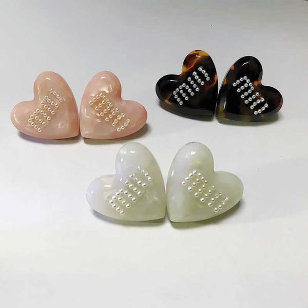 Brand Designer MIUMIU Fashion Letter Love Earrings Temperament High Grade Simple Daily Resin 925 Silver Needle Earrings Valentine's Day gifts Accessories Jewelry
Brand Designer MIUMIU Fashion Letter Love Earrings Temperament High Grade Simple Daily Resin 925 Silver Needle Earrings Valentine's Day gifts Accessories Jewelry