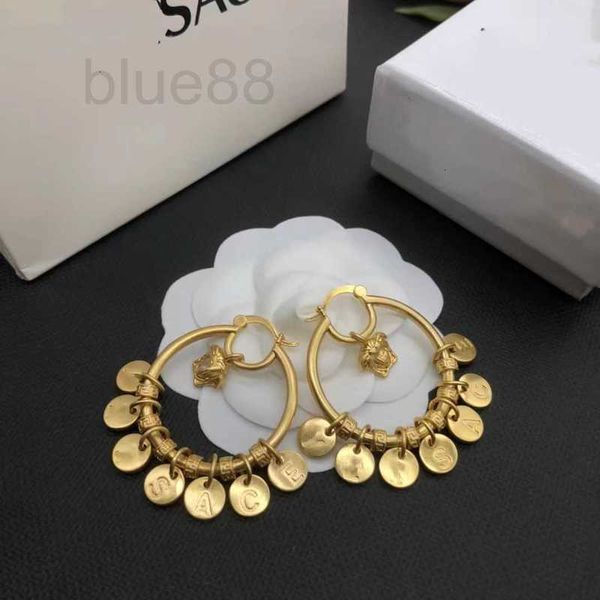 charm designer large circle, circular, small tassel, beautiful head letter earrings, niche design, fashionable and versatile earrings for wo, Golden
charm designer large circle, circular, small tassel, beautiful head letter earrings, niche design, fashionable and versatile earrings for wo, Golden