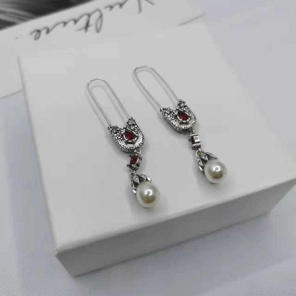 fashion designer alexander mq 21 pin pearl earrings women's advanced temperament personality red diamond, Golden
fashion designer alexander mq 21 pin pearl earrings women's advanced temperament personality red diamond, Golden