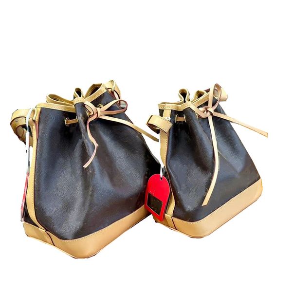 shoulder bag designed by designer, color changing leather bucket bag, crossbody bag wallet
shoulder bag designed by designer, color changing leather bucket bag, crossbody bag wallet