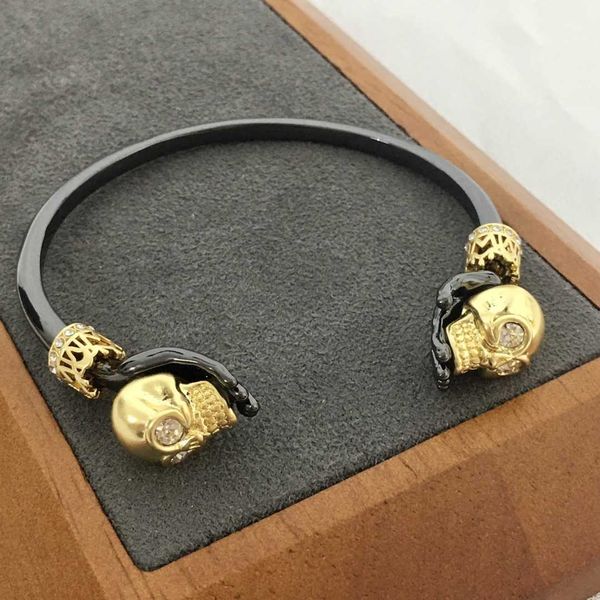 fashion designer alexander queen skeleton bracelet for men and women with a and personalized style brass plated colored ghost hand bracelet, Black
fashion designer alexander queen skeleton bracelet for men and women with a and personalized style brass plated colored ghost hand bracelet, Black
