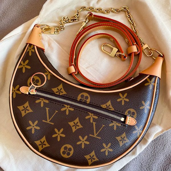 m81098 half moon croissants clutch loop bag luxury pochette designer women's mens purse and handbag sling bag genuine leather shoulder
m81098 half moon croissants clutch loop bag luxury pochette designer women's mens purse and handbag sling bag genuine leather shoulder