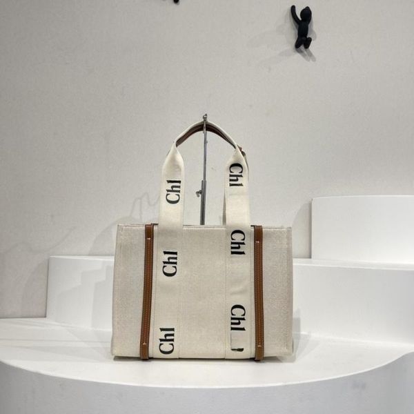 luxury designer women's tote tote shopping bag canvas tote bag two size large capacity commuter casual bags
luxury designer women's tote tote shopping bag canvas tote bag two size large capacity commuter casual bags