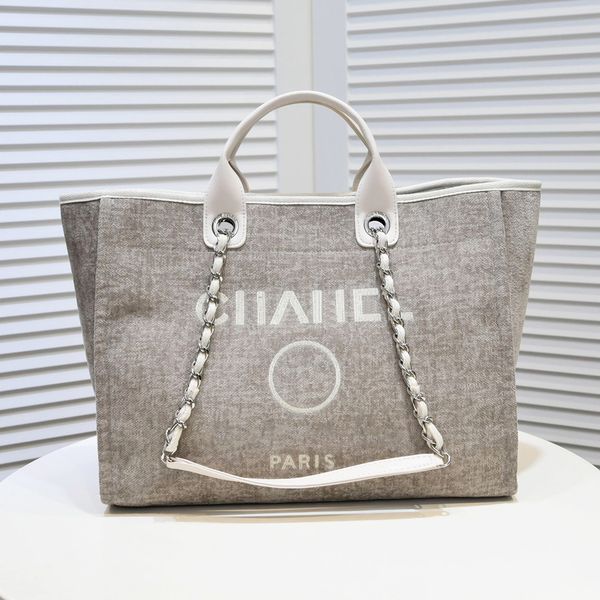 woman luxury designer handbags canvas bag channel tote bag large capacity handbags shoulder bag casual travel bag cross body beach bags fash
woman luxury designer handbags canvas bag channel tote bag large capacity handbags shoulder bag casual travel bag cross body beach bags fash