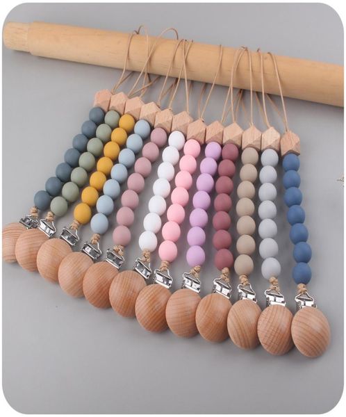 silicone pacifier holder with wood clip for baby simple design kids pacifiers clips chain silicone beads without sharp edges and c5607673
silicone pacifier holder with wood clip for baby simple design kids pacifiers clips chain silicone beads without sharp edges and c5607673