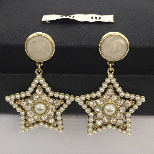Brand Designer MiuMiu Fashion Earrings Imitation Crystal Pearl Five Point Star for Women with Advanced Feeling Full of Diamond Star Earrings Accessories Jewelry
Brand Designer MiuMiu Fashion Earrings Imitation Crystal Pearl Five Point Star for Women with Advanced Feeling Full of Diamond Star Earrings Accessories Jewelry