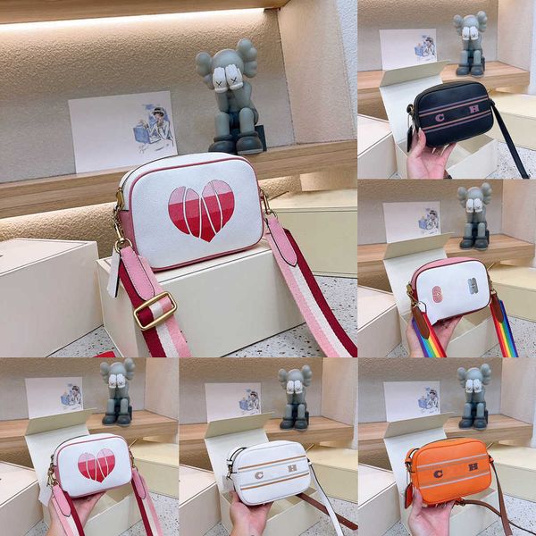 designer camera bag purse luxurys handbags women cute heart rainbow snapsshoulder bags wide strap cross body hand bag crossbody wallet 23081
designer camera bag purse luxurys handbags women cute heart rainbow snapsshoulder bags wide strap cross body hand bag crossbody wallet 23081