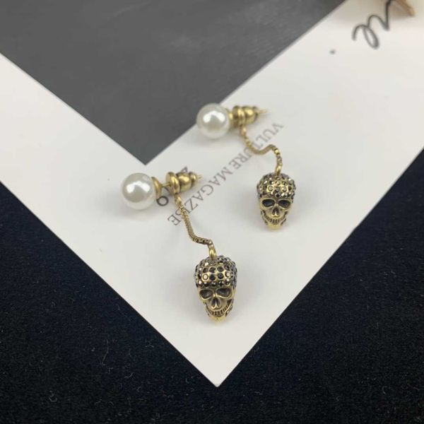 fashion designer alexander queen skeleton head pearl earrings for women's advanced style personalized style long chain earrings, Golden
fashion designer alexander queen skeleton head pearl earrings for women's advanced style personalized style long chain earrings, Golden