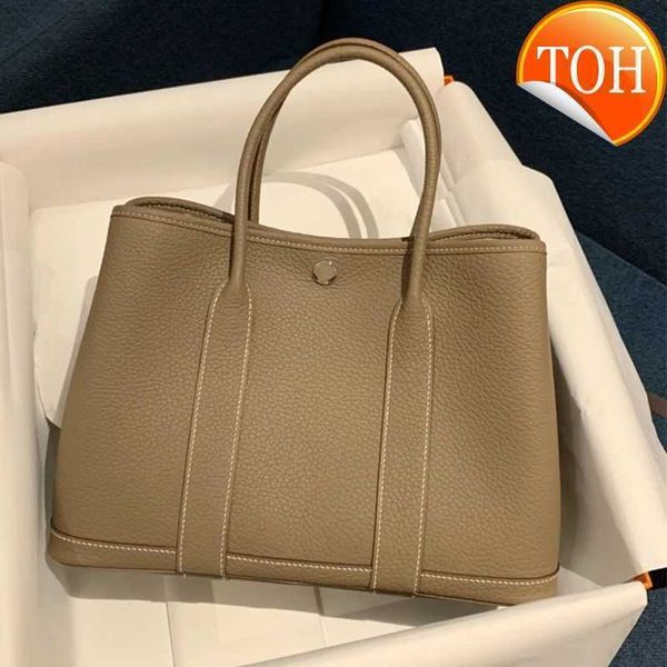 women's luxury designer handbags 2023 new texture leather garden bag large capacity portable bucket single shoulder crossbody bags fact
women's luxury designer handbags 2023 new texture leather garden bag large capacity portable bucket single shoulder crossbody bags fact