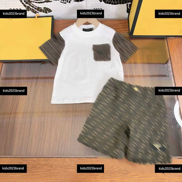 tracksuits kids designer clothes short sleeve sets baby summer suits 2pcs round neck t-shirt and letter printed denim shorts, White
tracksuits kids designer clothes short sleeve sets baby summer suits 2pcs round neck t-shirt and letter printed denim shorts, White