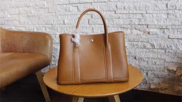 shopping totes h bag cowhide lady handbag fashion garden party shoulder bag designer high-capacity wallets genuine leather classic retro pur
shopping totes h bag cowhide lady handbag fashion garden party shoulder bag designer high-capacity wallets genuine leather classic retro pur