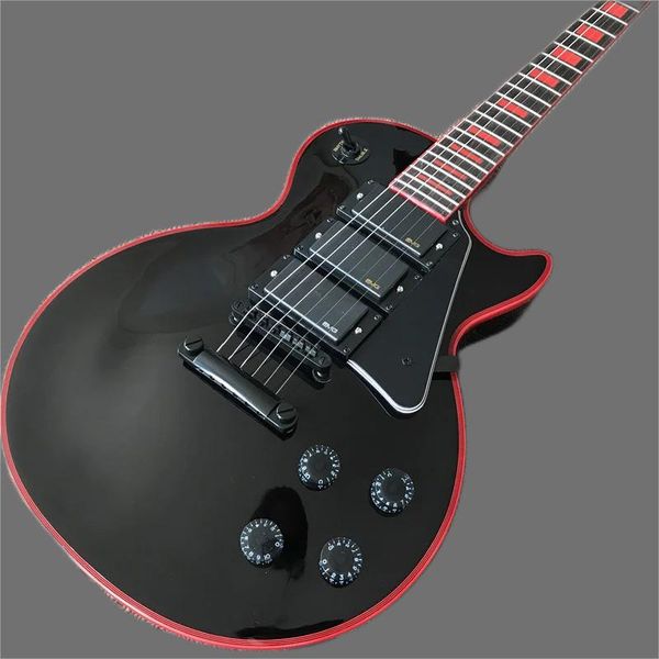 new arrival custom electric guitar in black color with 3 pickups and red inlays and bindings, with black hardware
new arrival custom electric guitar in black color with 3 pickups and red inlays and bindings, with black hardware