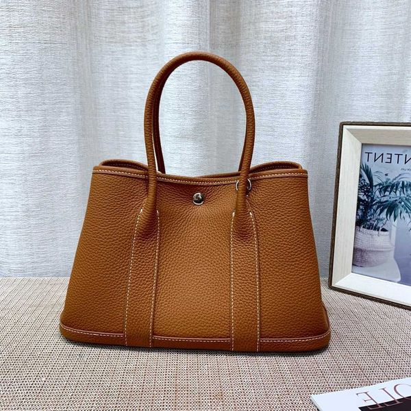 bag 10a cowhide shopping lady totes handbag garden fashion garden party shoulder designer high-capacity wallets leather classic
bag 10a cowhide shopping lady totes handbag garden fashion garden party shoulder designer high-capacity wallets leather classic