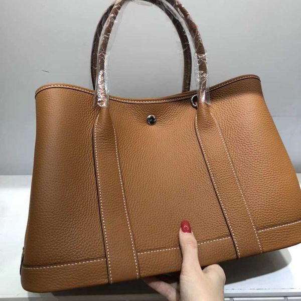 party leather garden designer cowhide tote bags shoulder strap 30 36cm garden bag portable messenger lady 3xrk
party leather garden designer cowhide tote bags shoulder strap 30 36cm garden bag portable messenger lady 3xrk