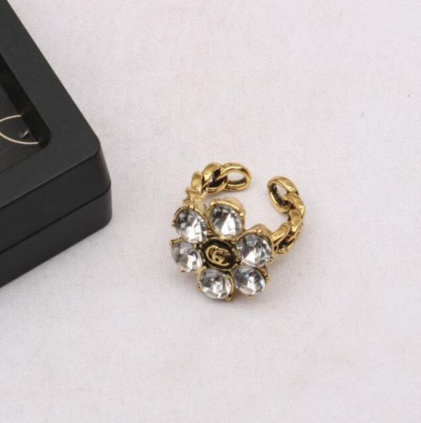 18k gold plated brand letter band rings for mens womens fashion designer open turquoise crystal metal daisy ring jewelry one size2042599, Silver
18k gold plated brand letter band rings for mens womens fashion designer open turquoise crystal metal daisy ring jewelry one size2042599, Silver