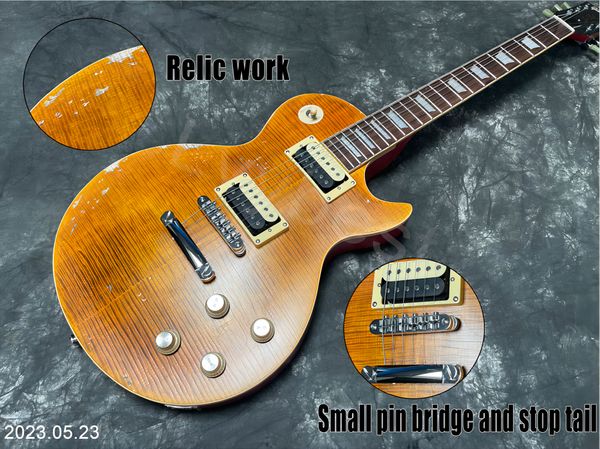 electric guitar with flame pellets, antique parts, small bridge pins and bone nuts, orange
electric guitar with flame pellets, antique parts, small bridge pins and bone nuts, orange